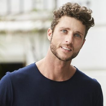 Handsome young man in blue, portrait